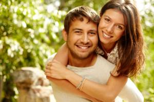 Happy couple having fun on summer vacation